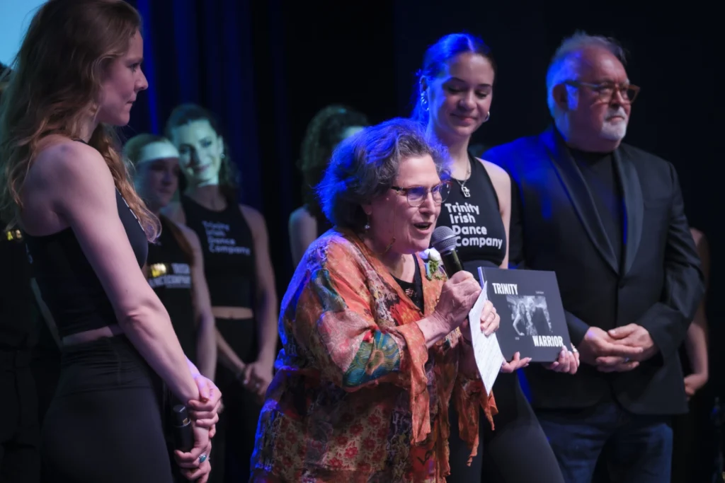 Gail Kalver accepts her award at the Trinity Irish Dance's Ceiliúradh 2026.